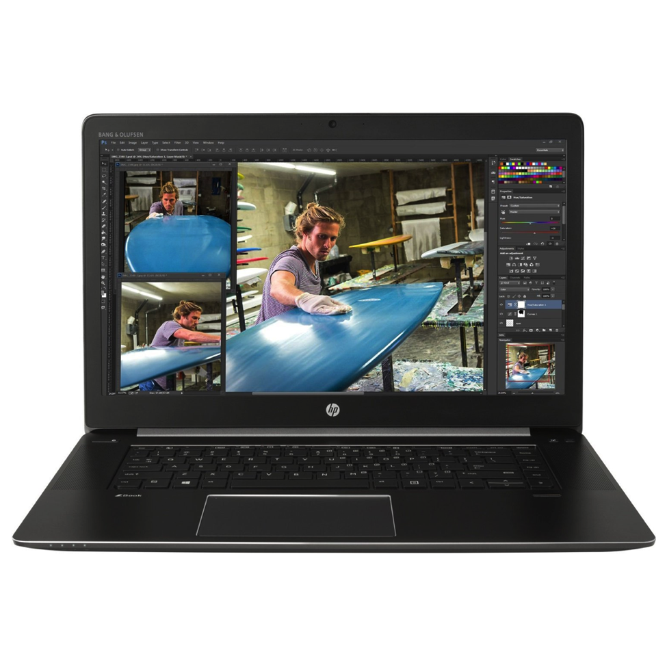 A computer with a screen showing a person on it Description automatically generated