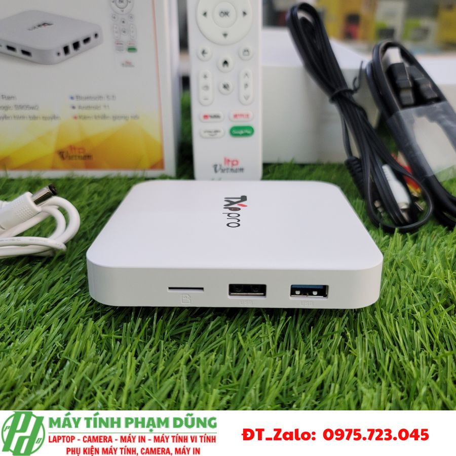 A white box on grass Description automatically generated