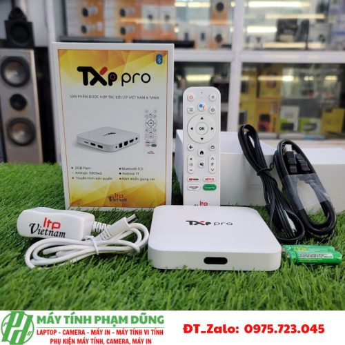A box with remote control and a box with wires Description automatically generated
