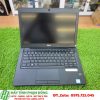 A computer on a grass surface Description automatically generated